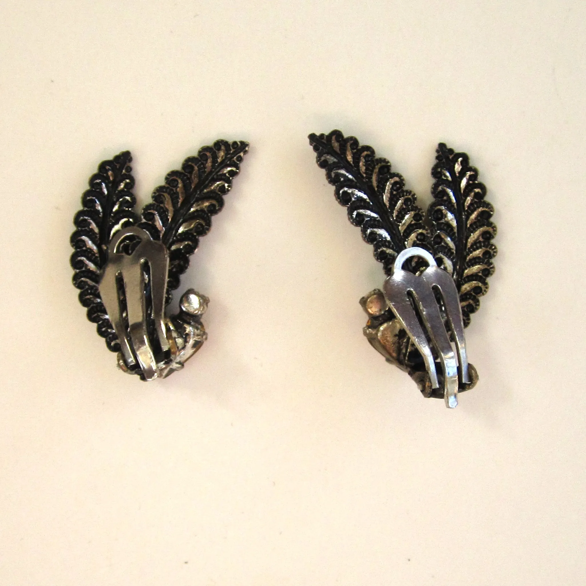 Circa 1970s Silver-tone Feather Earrings with Gold Rhinestones