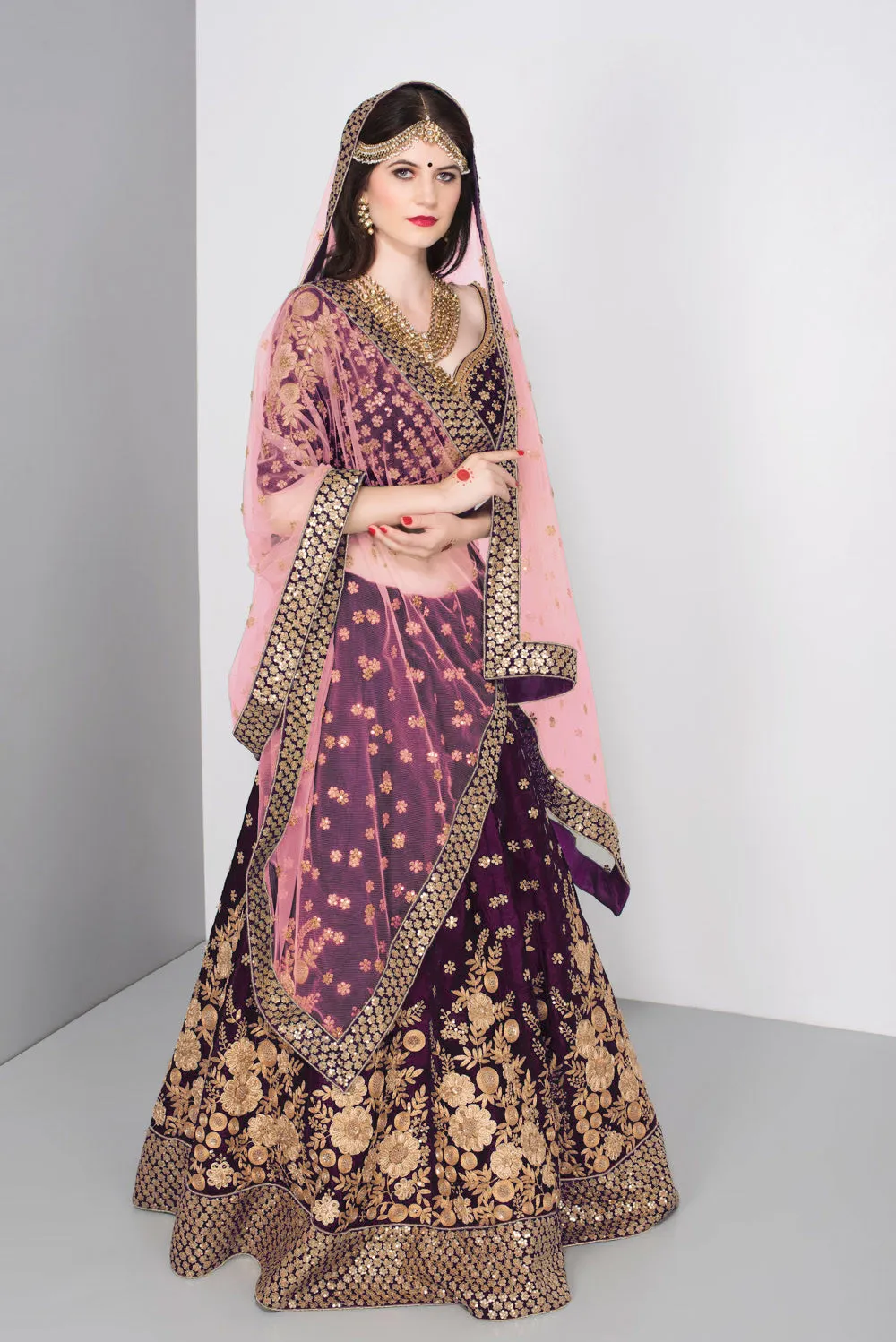 Stunning Purple Colored Party Wear Embroidered Lehenga Choli